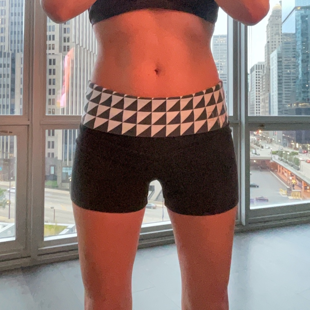 Small PINK yoga/workout shorts. Black with checkered detail